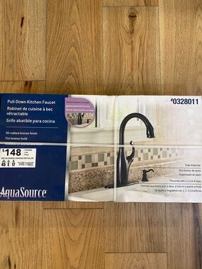 Oil-Rubbed Bronze Pull-Down Kitchen Faucet - Single Handle. Brand new in box.
